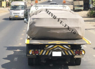 Can you guess which Porsche supercar is hidden under this cover? Prices range from $2.5 million to $3.5 million.