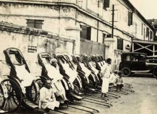 Hanoi residents driving convertibles in 1943