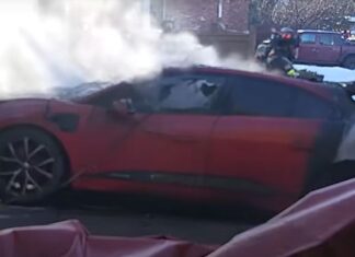 Firefighters use blanket to put out electric car fire