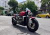 “The Power Couple’s Rocket: A Rare Triumph Motorcycle Up for Grabs”