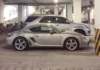 A Porsche Cayman Covered in Dust: A Sad Sight in an Underground Parking Lot of a Luxury Urban Area in Hanoi