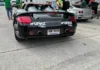 The Ultimate Supercar Spectacle: Porsche Carrera GT Graces the Streets of District 1, a Thai Magnate’s Pride and Joy Leads the Pack in the Gumball 3000 Rally.