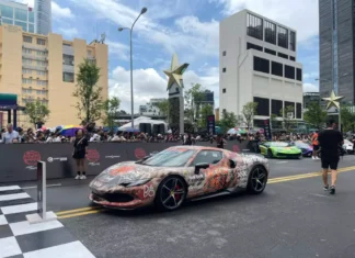 The Great Gumball 3000 2024 Rally: A Fleet of Super Cars Embark on an Adventure from Vietnam to Cambodia, Led by the Stunning Ferrari 296 GTB.