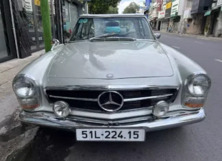 A Chilly Saigon Evening, “Mr. Vu” Cruises the Town in His Mercedes-Benz 280 SL, Turning Heads Along the Way.