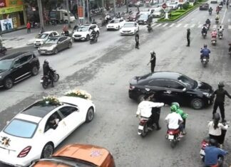 The Arrest of Four Security Guards for Clearing Roads and Directing Traffic for a Wedding