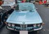 A Vintage BMW 2800CS Cruises the Streets of Saigon