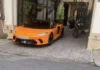 The McLaren GT: A Stunning Orange Bride in Hanoi