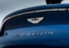 The Ultimate Wordsmith: Crafting Captivating Copy for Aston Martin’s Electrifying Future
“Aston Martin Revamps Operations: Streamlining Workforce, Strategically Postponing Electric Vehicle Launch”