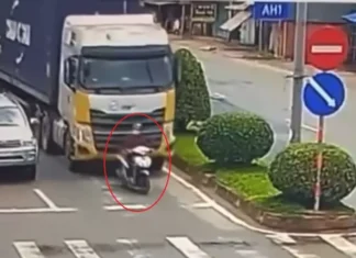 The Tragic Death of a Female Motorcyclist: A Chilling Camera Footage Reveals Her Final Moments Under a Container Truck in Tay Ninh