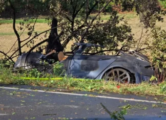 Electric Car Fire Claims Lives of Two Children After Door Handles Fail to Open